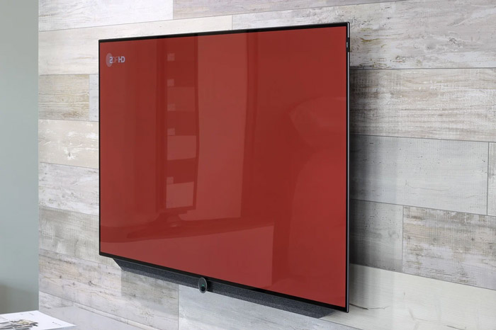 A TV is mounted on a wall